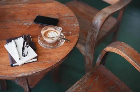Coffee cup on rustic wood table Stock Photos