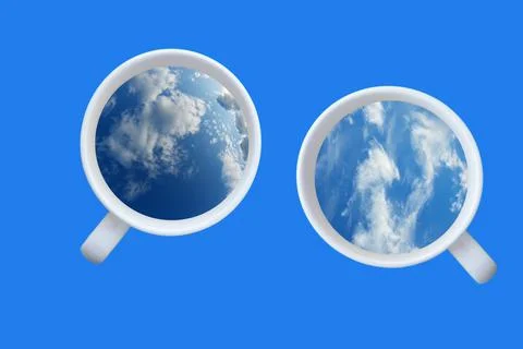 Coffee cup in shape of balloon with clouds on blue paper background. Stock Photos