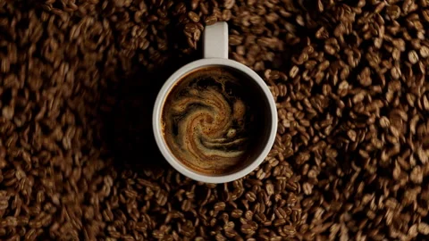 Coffee cup sliding over a bed of beans. Stockbeeldmateriaal 328628418