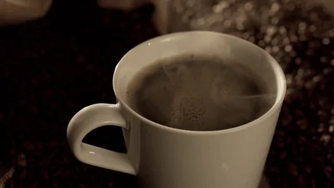 Coffee in a cup in slow motion Video stock 76051906