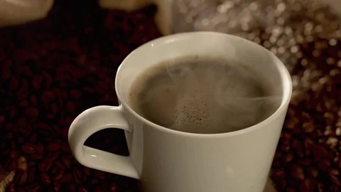 Coffee in a cup in slow motion Stock Footage 76051928