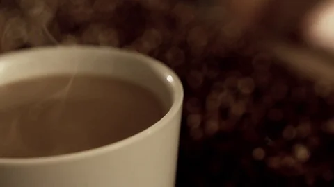 Coffee in a cup in slow motion Stock Footage 76052000