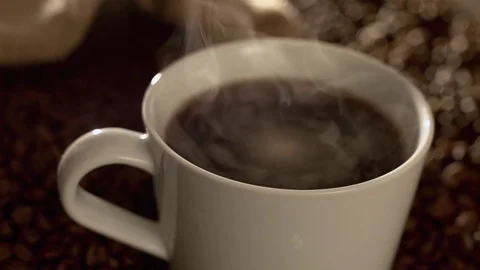 Coffee in a cup in slow motion Stock Footage 76100198