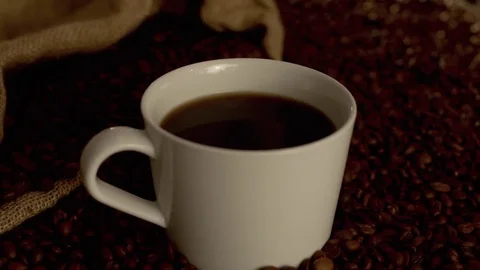 Coffee in a cup in slow motion Stock Footage 76100298