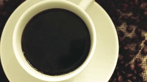 Coffee in a cup in slow motion Stock Footage 76249176