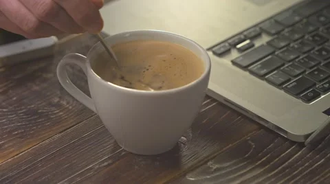 Coffee cup with smart phone and laptop Stock Footage 60362505