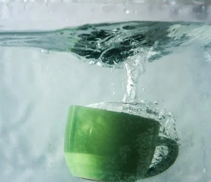 Coffee cup splash Stock Photos