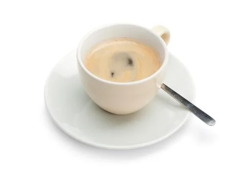Coffee cup with spoon Stock Photos