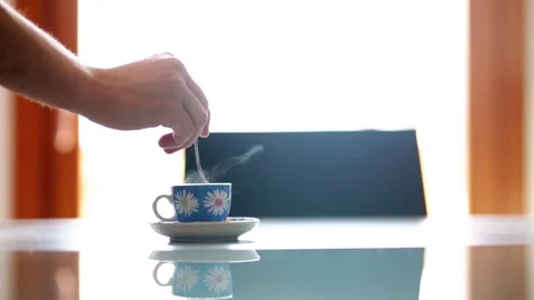 Coffee cup stirred with spoon Stock Footage 108598147