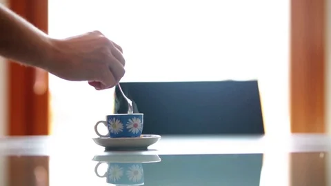Coffee cup stirred with spoon Stock Footage 108598190