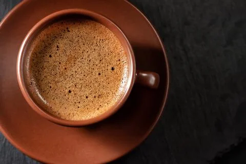 Coffee cup on stone background. Top view with copy space for your text Stock Photos