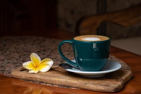 Coffee cup on stone kitchen table. Cappuccino, hot latte or coffee with milk. Stock Photos