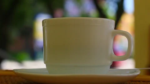 Coffee cup with street background Vídeo Stock 27879506