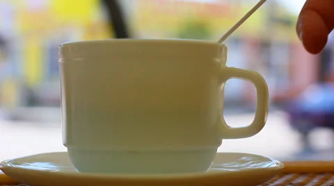 Coffee cup with street background Stock Footage 27879574