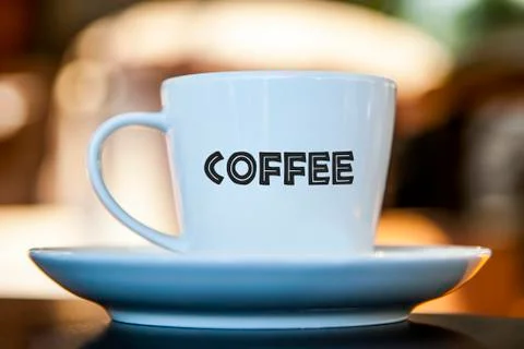 Coffee cup on a table with bokeh background Foto stock