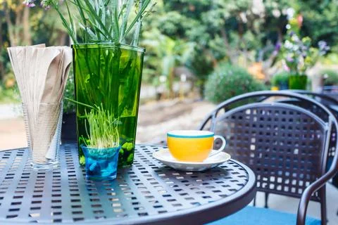Coffee cup on table in cafe Stock Photos