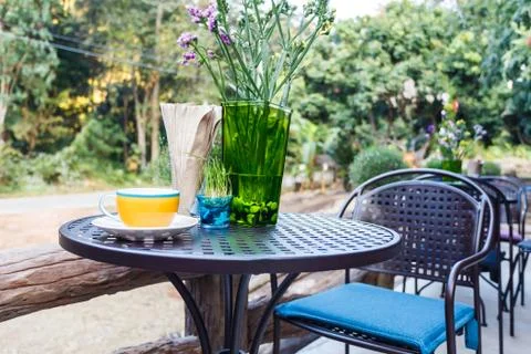 Coffee cup on table in cafe Stock Photos