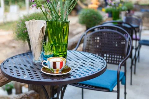 Coffee cup on table in cafe Stock Photos