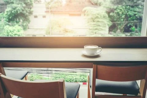 Coffee cup  on table in cafe Stock Photos