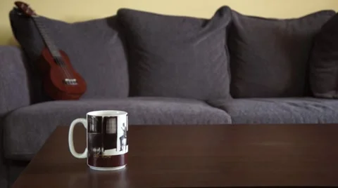 Coffee cup on a table Stock Footage 41872959