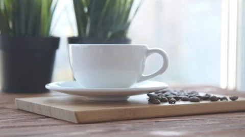 Coffee cup is on the table Stock Footage 68969779