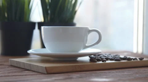 Coffee cup is on the table Stock Footage 68969867