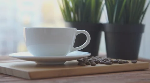 Coffee cup is on the table Stock Footage 68970059