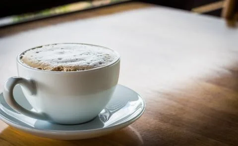 Coffee cup on table Foto stock