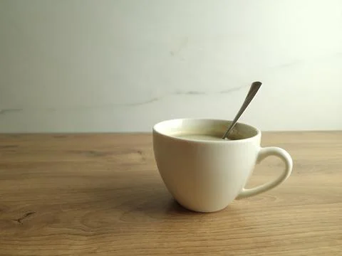 Coffee cup on a table Stock Photos