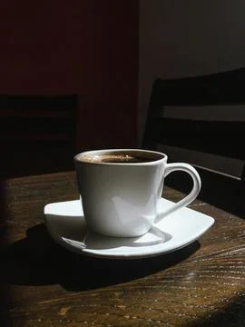 Coffee cup on the table Stock Photos