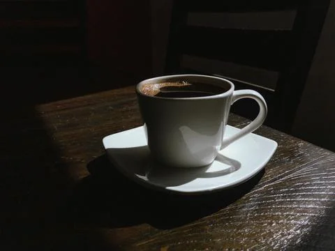 Coffee cup on the table Stock Photos