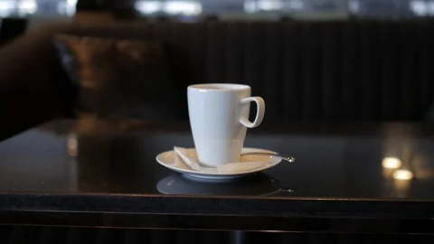 Coffee Cup on the table in the restaurant Stock Footage 79530599
