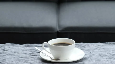 Coffee in a cup on the table. selective focus. Stock Footage 147968890