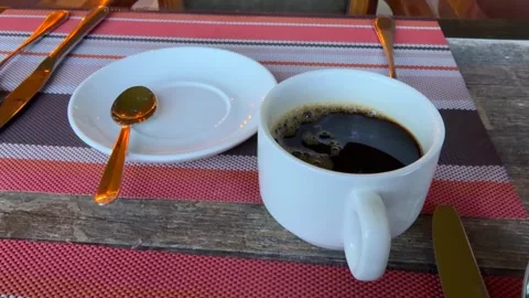 Coffee Cup on Table at Tropical Resort Morning Breakfast Scene Stockbeeldmateriaal 332615534