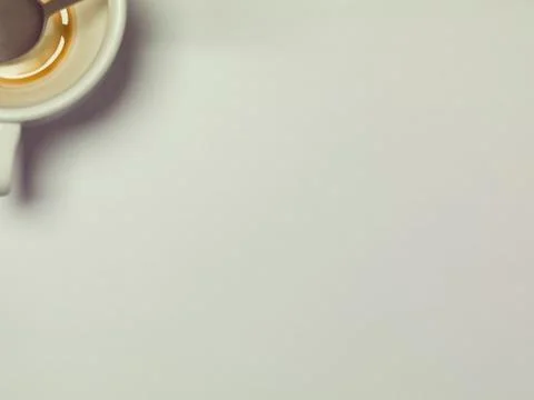 Coffee cup, top view of the table and a blank sheet of paper, copy space Stock-Fotos