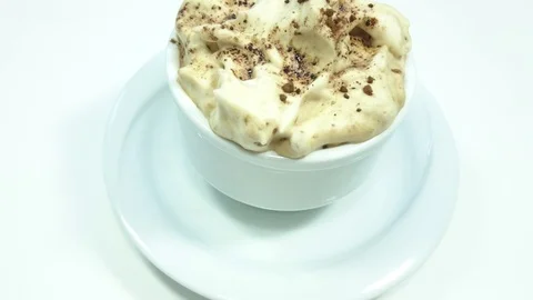 Coffee into cup on white background Stock Footage 90017457