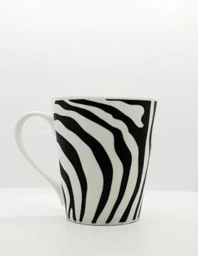 A coffee cup with zebra line pattern Stock Photos