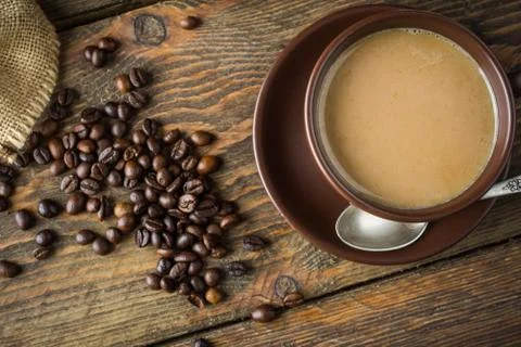 Coffee cups, beans Stock Photos