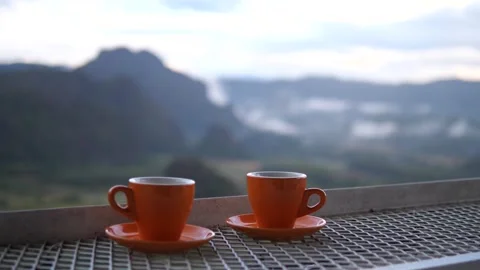 Coffee Cups on Cafe Balcony with Mountain Fog View Calm Morning Atmosphere Video stock 325237025