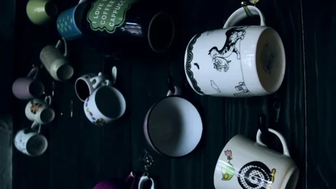 Coffee cups hanging on the wall Stock Footage 70732235