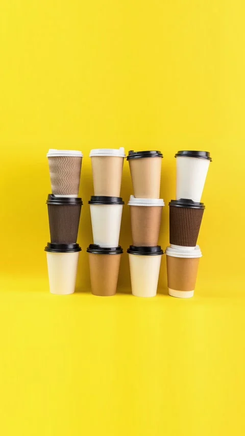 Coffee cups vertical yellow stop motion Vídeo Stock 279668876