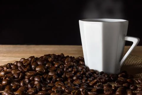 Coffee in the darkness. Stock Photos