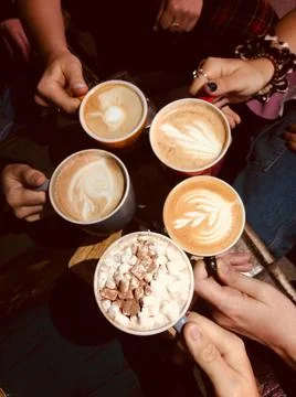 Coffee date with a group of friends Stock Photos