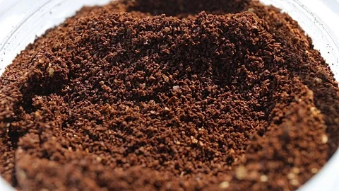 Coffee dosage from a jar with a small spoon Stock Footage 74863177