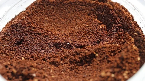 Coffee dosage from a jar with a small spoon Stock Footage 74864038