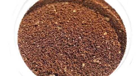 Coffee dosage from a jar with a small spoon Stock Footage 74896281