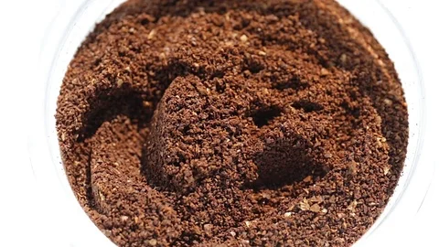 Coffee dosage from a jar with a small spoon Stock Footage 74899288