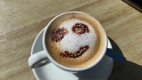 Coffee with drawn smiley face concept morning happiness cappuccino Stock Footage 236123730