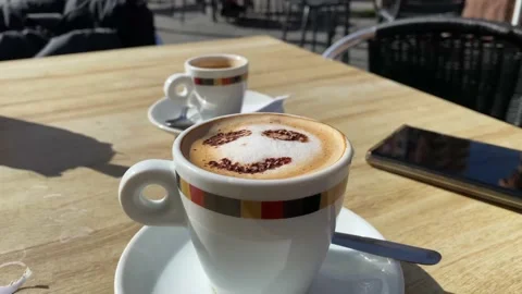 Coffee with drawn smiley face concept morning happiness cappuccino Stock Footage 236123772
