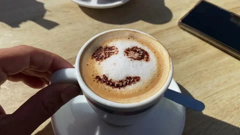 Coffee with drawn smiley face concept morning happiness cappuccino Stock Footage 236123773